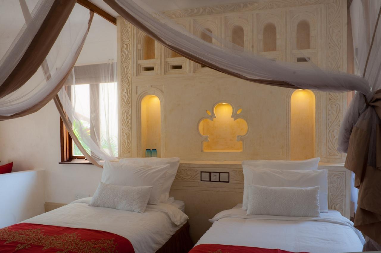 Swahili Beach Diani Beach Exterior foto A bedroom at the hotel